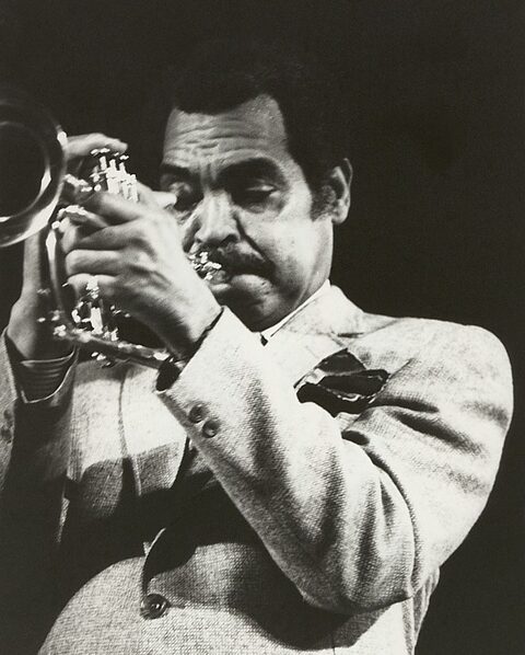 Art Farmer with his flugelhorn, black-and-white photo.