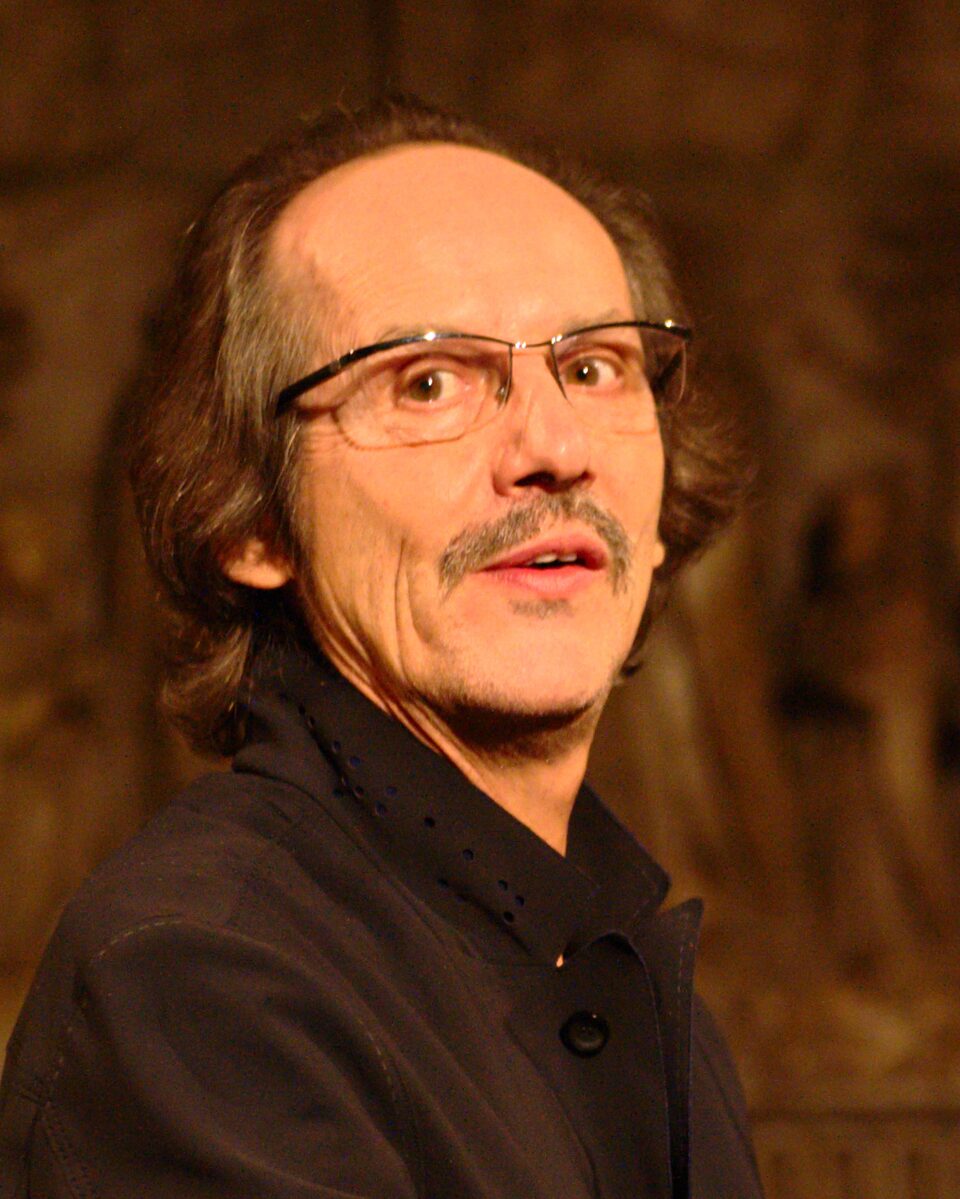 François Couturier at the grand piano during a concert with Anja Lechner in the Stadtkirche in Darmstadt, Germany, 2015.