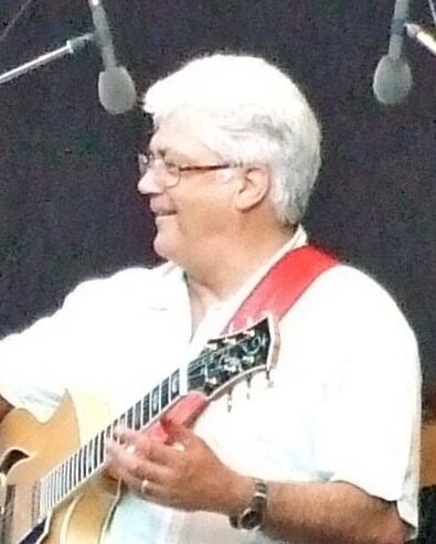 Larry Coryell with his guitar at “Jazz im Palmengarten” in Frankfurt am Main, Germany, 2009.