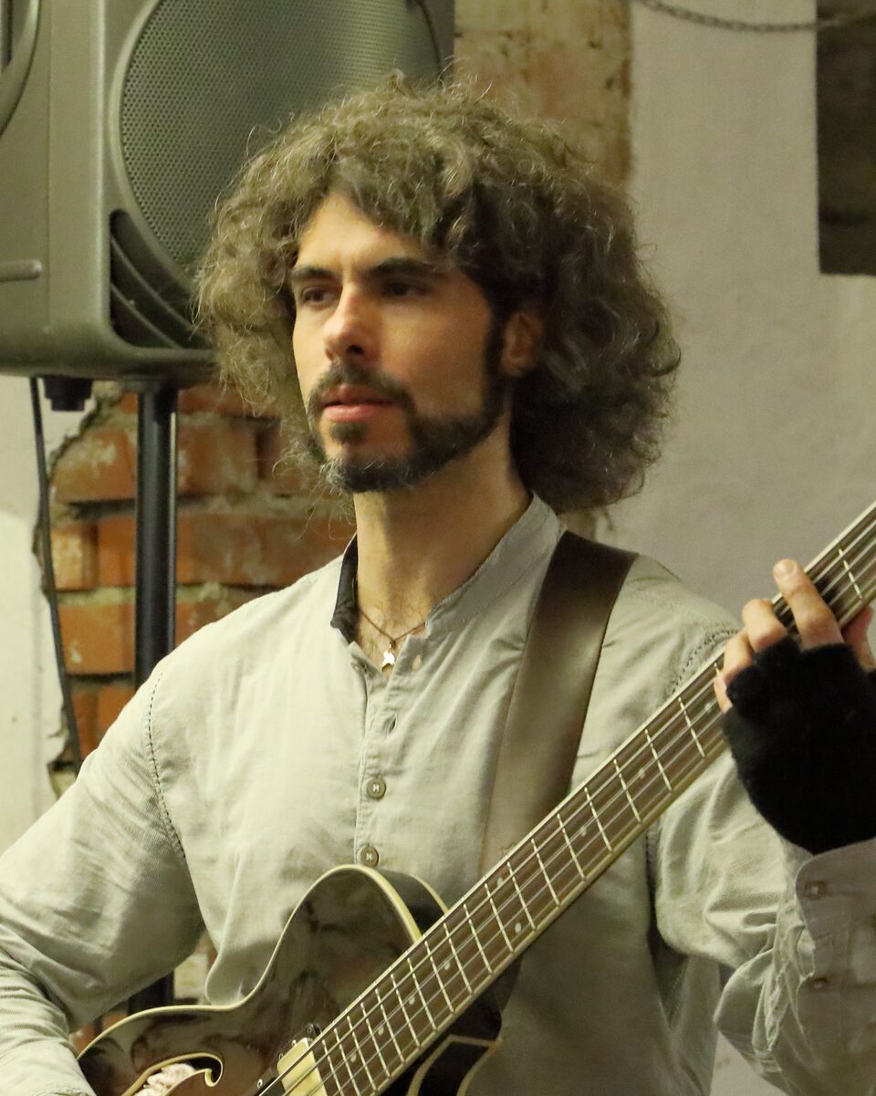 Raphael Preuschl with his bass guitar during a performance by the Fabulous Austrian Trio at the INNtöne Jazz Festival 2019 in Diersbach, Austria.